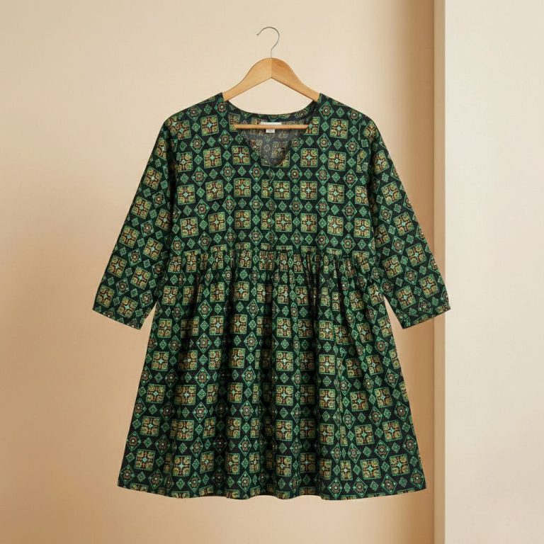 Emerald green cotton kurti with floral print, front view — Aaveno
